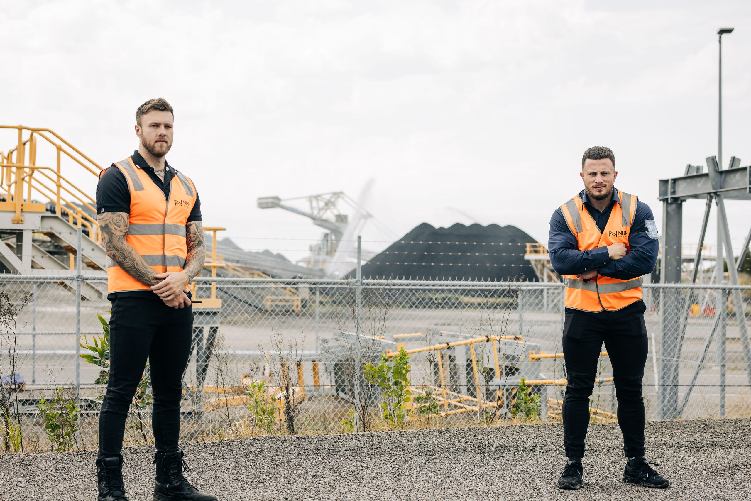 Two NHN staff protecting worksite